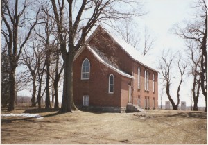 Old red brick former schoolhouse