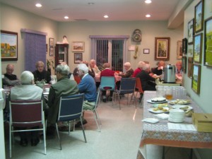 Sitting around tables for a special presentation