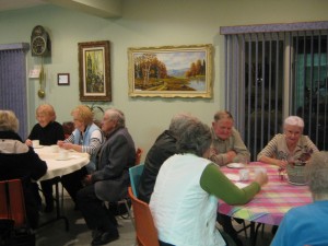 Guests sitting around tables in the Heritage Centre