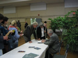 Guests line up to greet Mr. and have a chance to get their books signed. After, coffee and delicious platz was served for a time of visiting together.