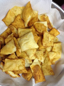 freshly made roll kuchen is piled into a bowl, ready for the meal