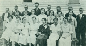 Church chqi» 1936. From left to right, first row: Mrs. John (Agnes) Enns,  Vera Hamm, Sara Wiens, Manja Cornies (Mrs. Geo. Krueger), Mary Toews  (Mrs. Abe Dick), Anna Toews (Mrs. John G. Braun)" Lena Walde (Mrs. P. A.  Warkentin). Second row: Gredel Wiens (Mrs. John Krueger), Justa Toews  (Mrs. Cornel. Toews), Anna Hildebrand (Mrs. J. A. Dyck), Mary Friesen  (Mrs. J. Barkqwsky), Helen Dyck (Mrs. John Sawatzky), Mary Konrad  (Mrs. John Janzeng Agnes Barkowsky (Mrs. Abr. J. Konrad), Katharina •....  Toews (Mrs .. Henry H. Enns). Third row: George Enns, Peter Dirksen, Peter ~.  Fast, John Enns, Peter F. Willms (choir leader), Rudy Dyck, Jacob Bar-  kowsky, Peter Hildebrand. -  