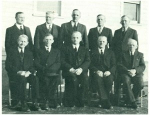 Ministers and deacons in 1947. Seated from left to right: Jac. Barkowsky  (deacon), Jac. J. Epp, N. N. Driedger, Jacob N. Driedger, H. B. Wiens  (deacon). Standing: Jac. D. Janzen, Gerhard Tiessen, Herman P .. Lepp,  Nicolai Schmidt, Abram Rempel.  