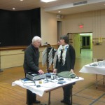 Bruno Penner and Candace Nast preparing equipment for the website launch