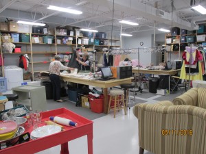 Two women sorting donated items at a table